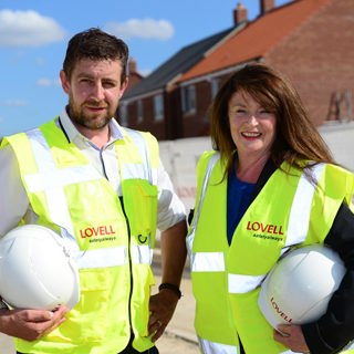 SGB 5895 Andy Askin (Left), Assistant Site Manager At The Spires With Sales Executive Sharon Jackson (Right)