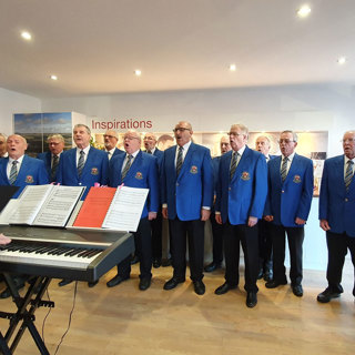 20191214 095827 The Ebbw Vale Male Choir Performing In The Marketing Suite At Golwg Y Bryn