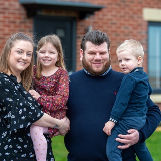 SGB 6356 The Sadler Family Outside Their New Lovell Home In Saxilby